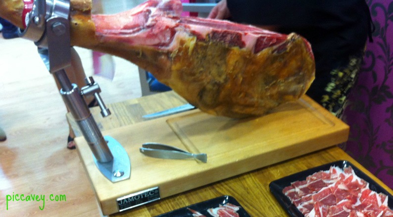 Spanish ham being sliced