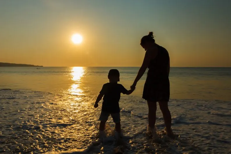 Family at the beach Expat in spain